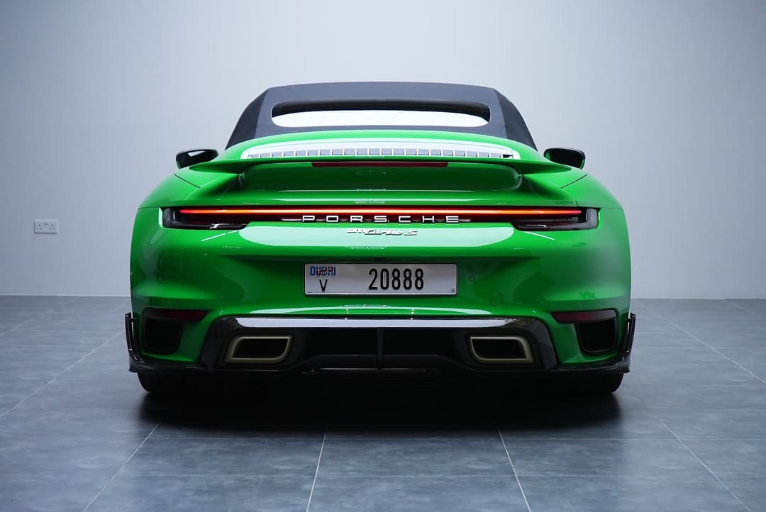 Porsche 911 Turbo S Green listed for rent in Dubai